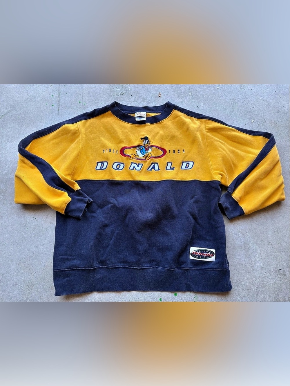 The Disney Store Donald Embroidered Authentic Color Block Sweatshirt Size Medium